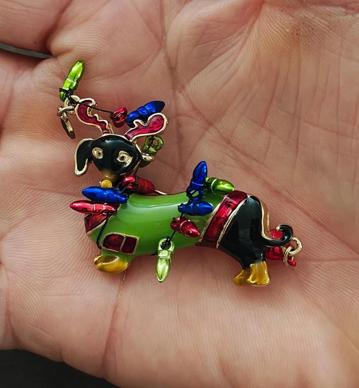 Dachshund Dog Wearing Reindeer Antlers and Wrapped In Colorful Lights Brooch