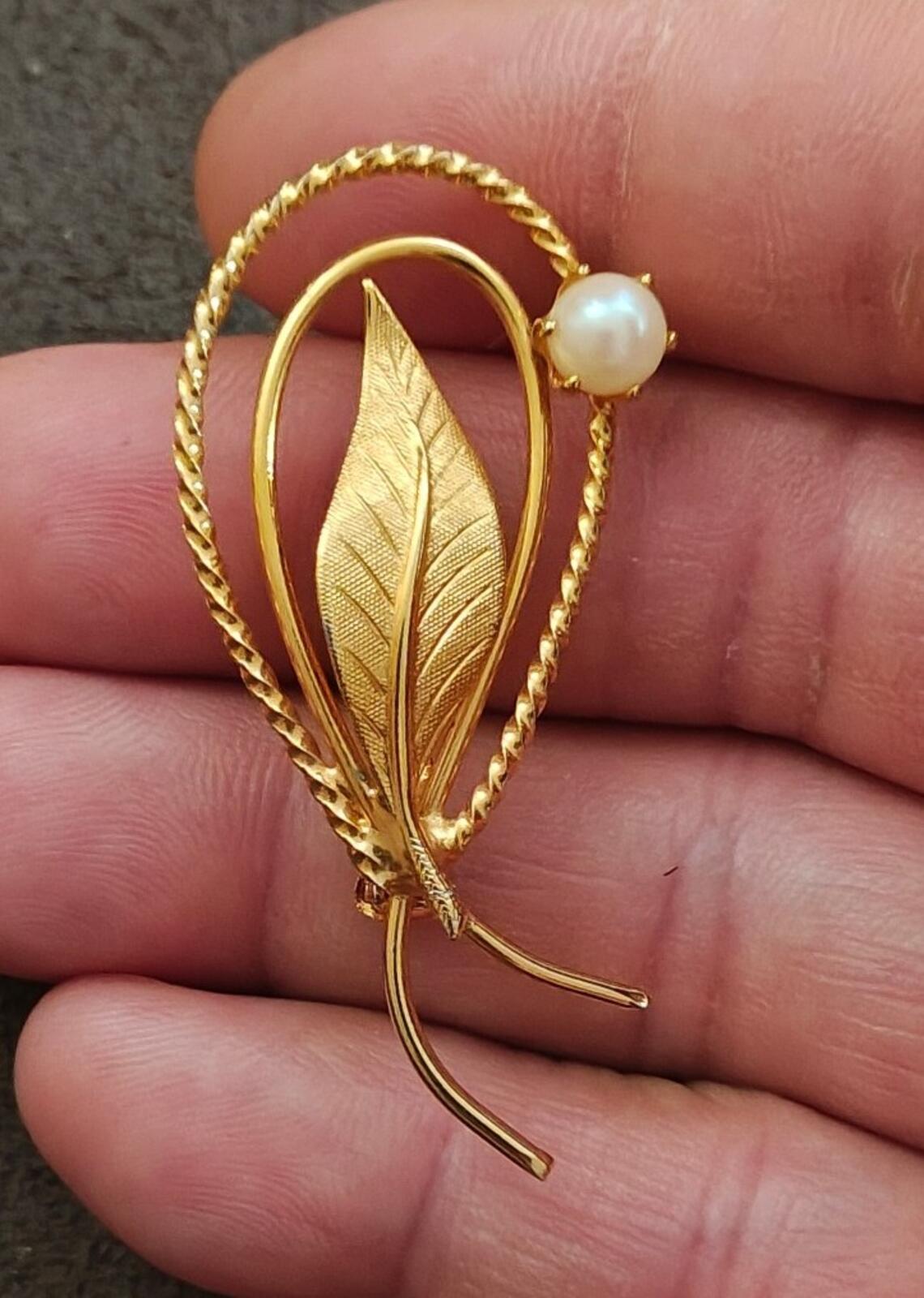 1960s Gold Tone Swirl Leaf Brooch With a Delicate Faux Pearl Accent