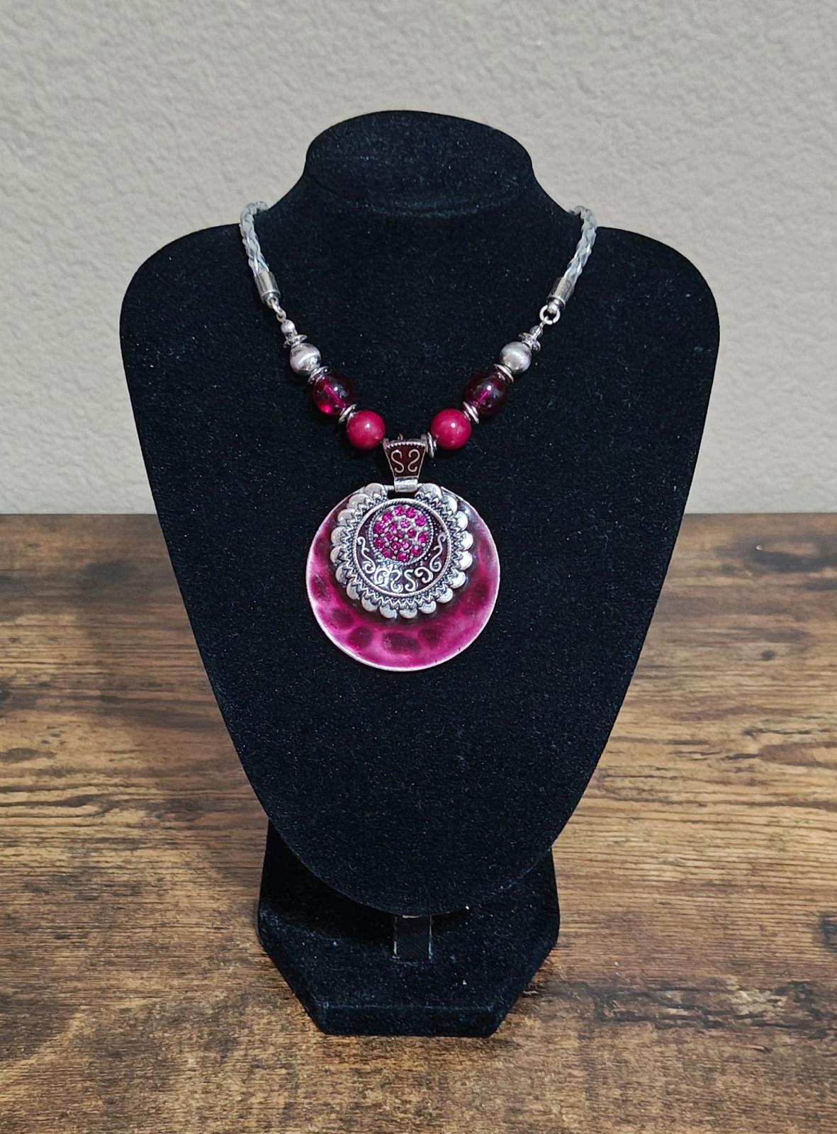 Silver Tone Braided Plastic Chain With Round Burgundy Pendant and Beaded Accents