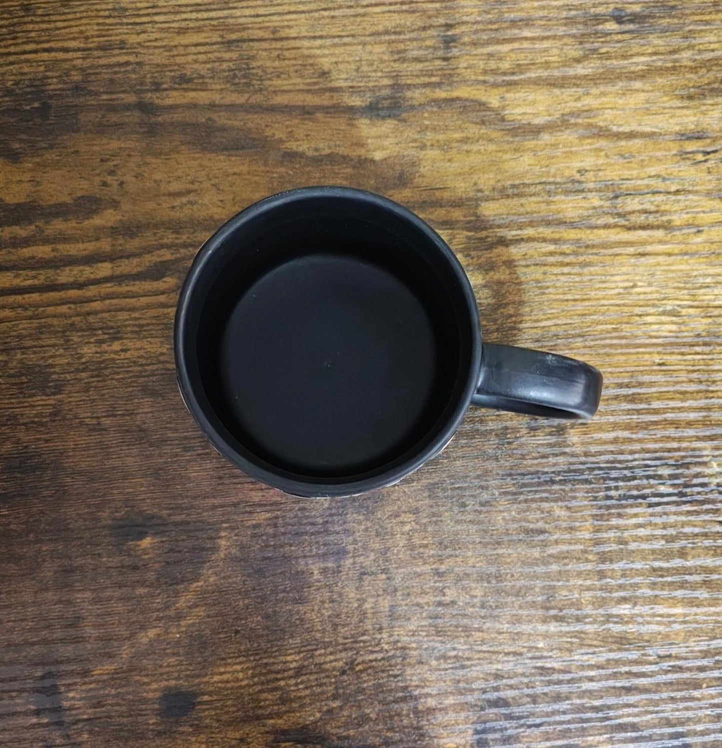 Dancing Skeletons Black Earthenware 13 oz 3D Embossed Black Mug.