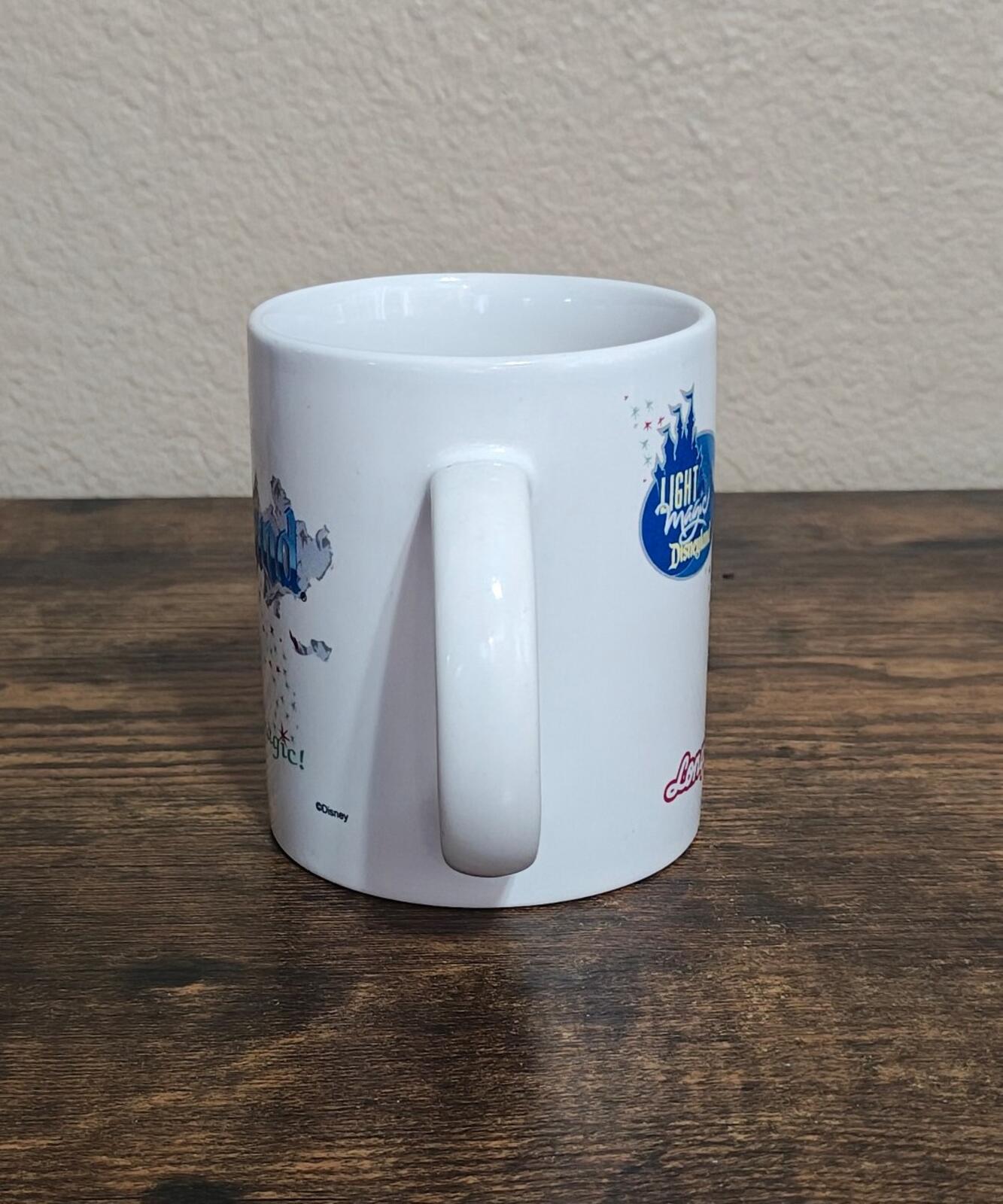 1997 Disneyland "Share The Magic" 11 oz White Ceramic Mug