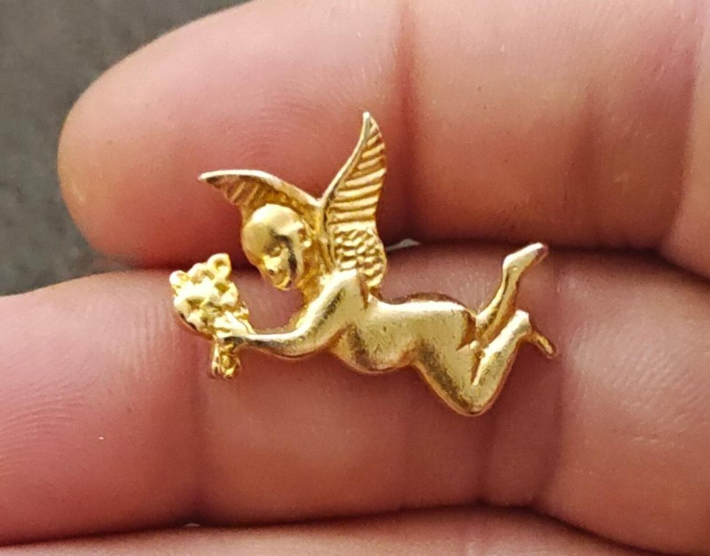 1990s Gold Tone Flying Angel Holding Flowers Brooch
