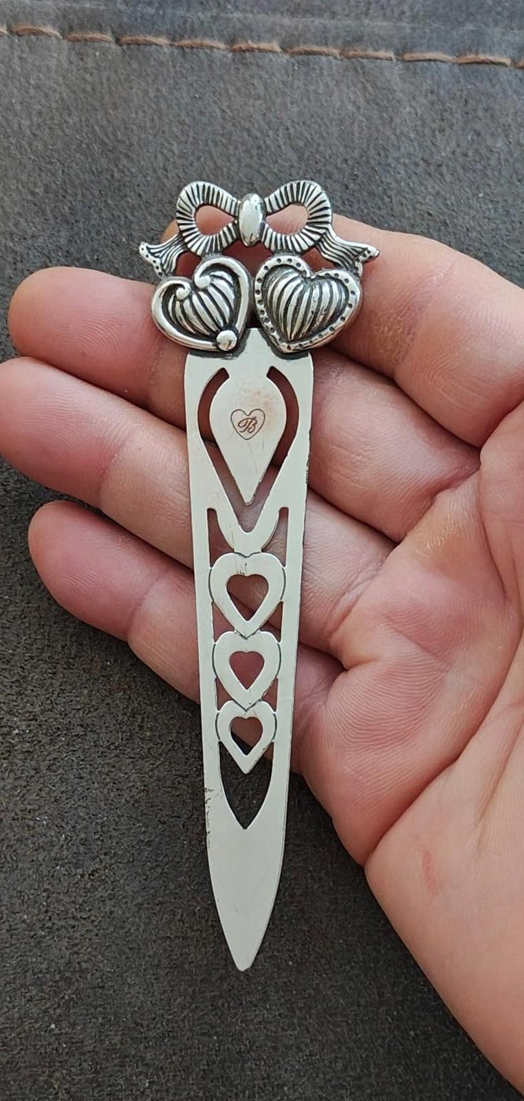 Silver plated letter opener bookmark with filigree hearts and decorative bow top