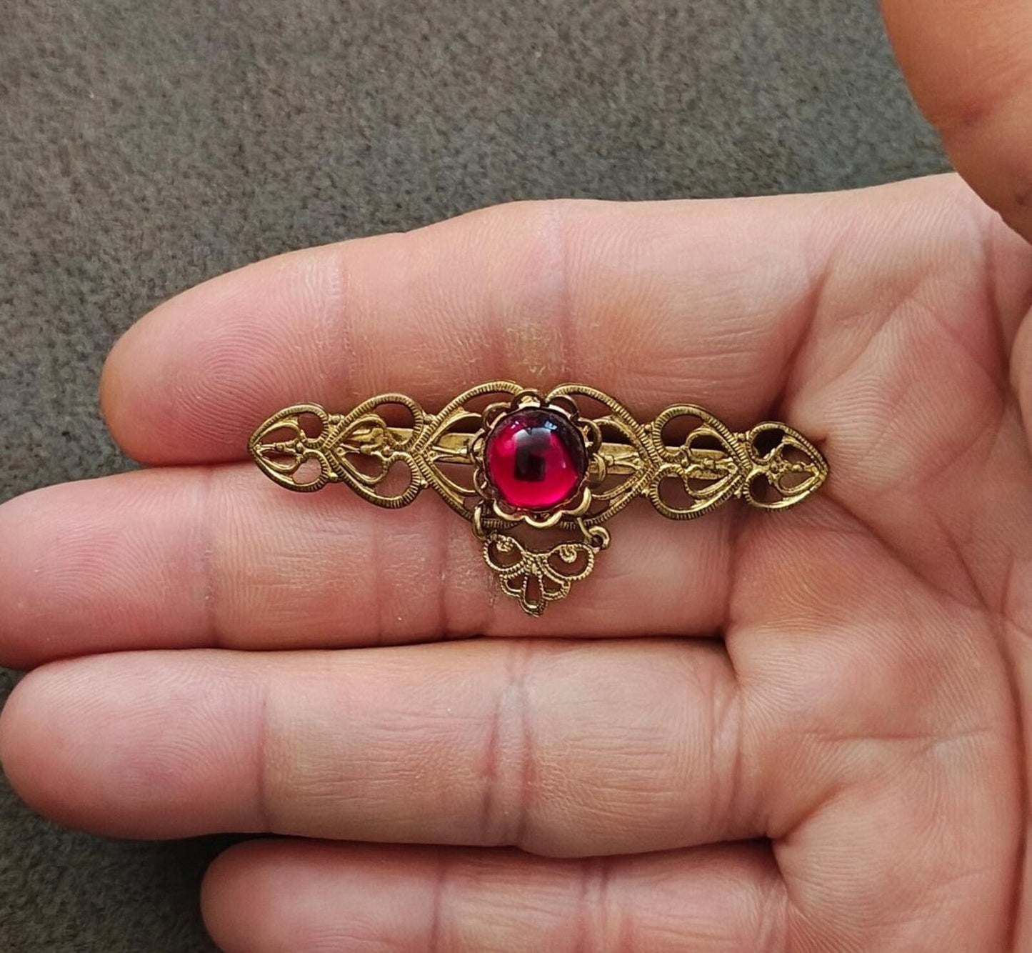 1960s/70s Goldtone Open Sideways Hearts With Center Red Jelly Cabochon Brooch