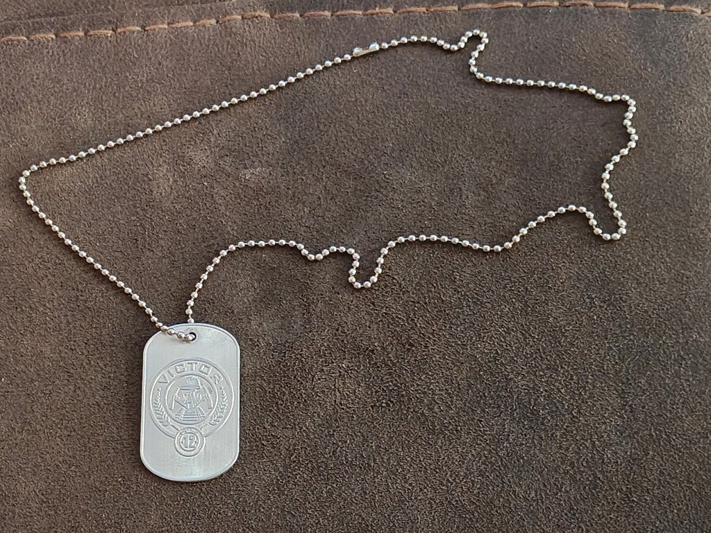 Promotional "The Hunger Games: Catching Fire" District 12 Victor Dog Tag