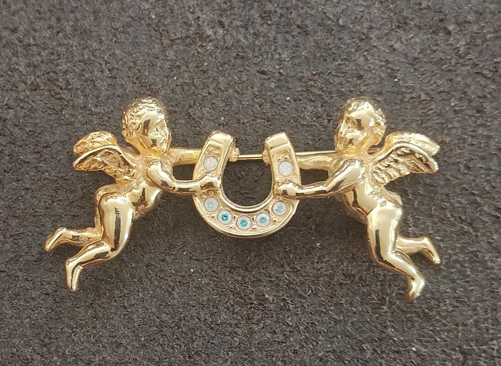 1980s Unsigned Kirks Folly Gold Tone Cherub & Lucky Horseshoe Brooch Pin