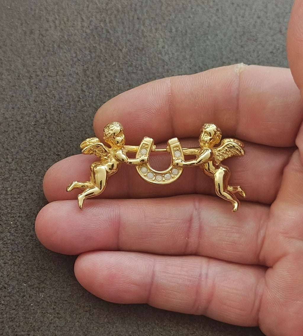 1980s Unsigned Kirks Folly Gold Tone Cherub & Lucky Horseshoe Brooch Pin