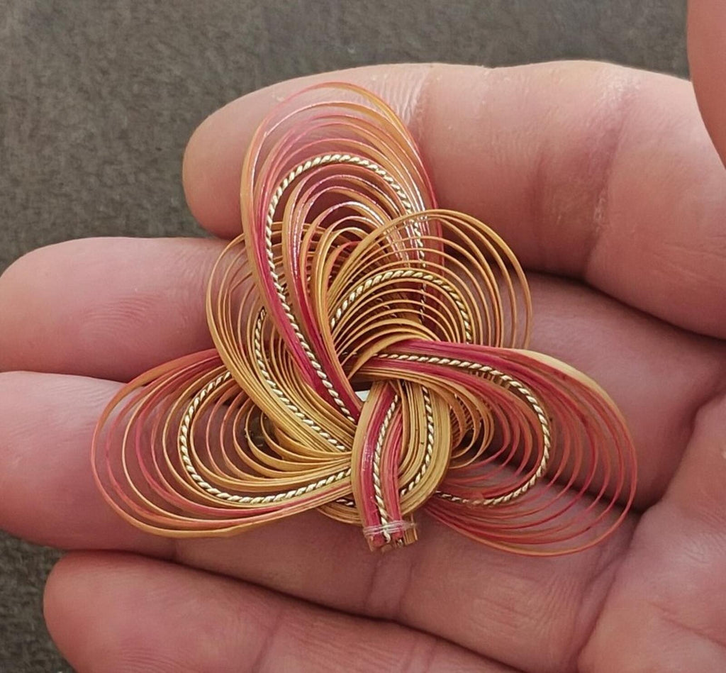 Quilled bamboo/rattan folk art brooch, multicolor spiral flower in pink, tan, and brown