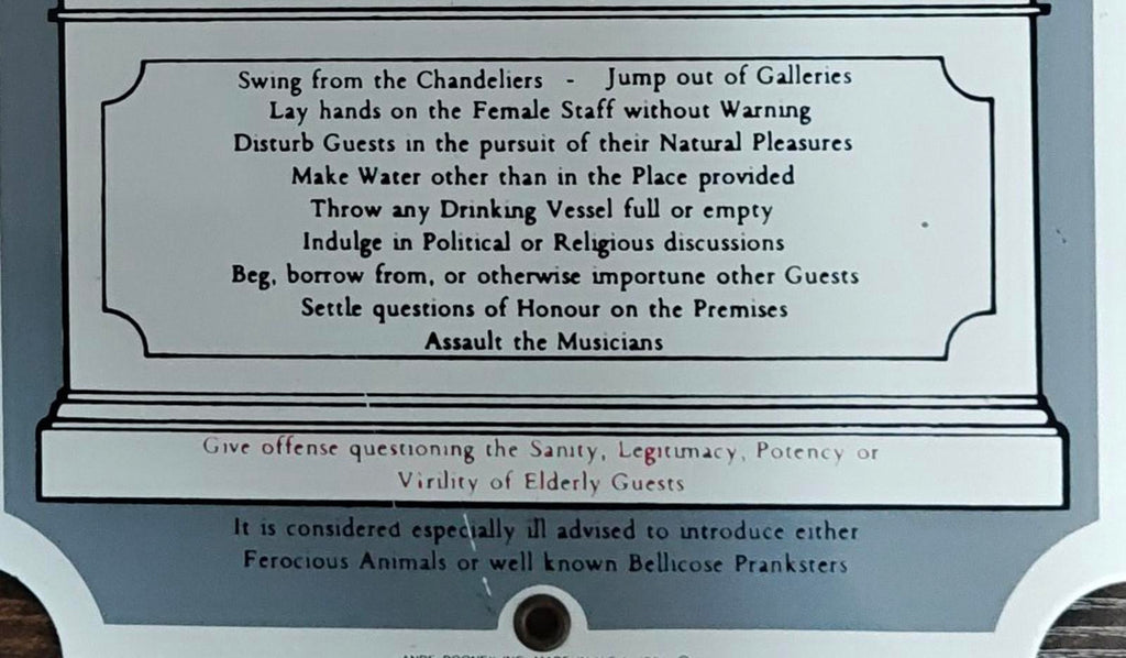 1991 Ande Rooney "The Rules of This House" Porcelain Enamel Metal Sign