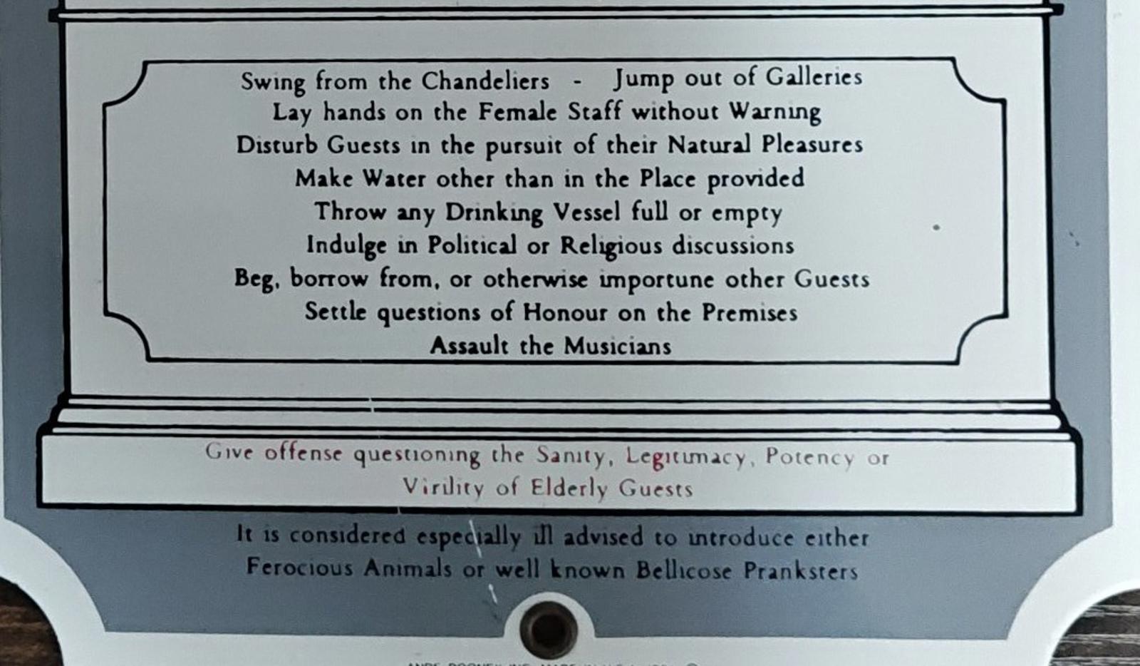 1991 Ande Rooney "The Rules of This House" Porcelain Enamel Metal Sign