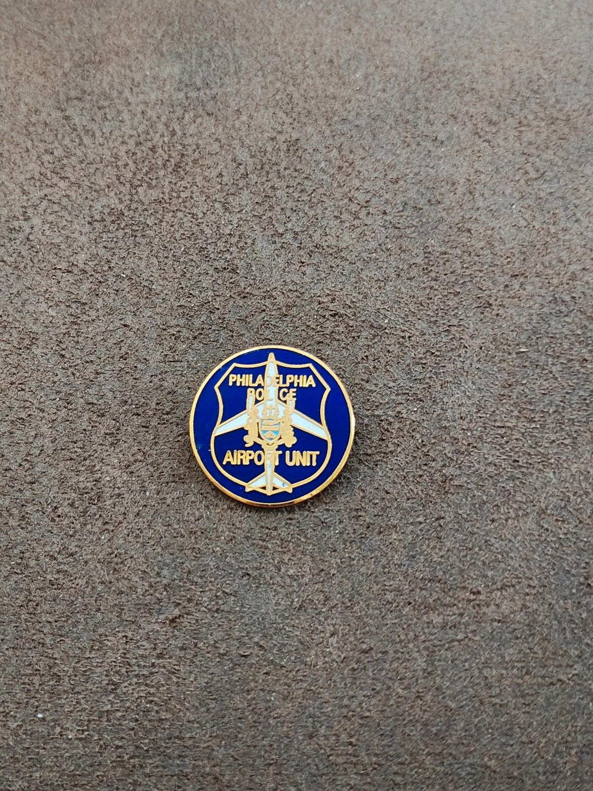Small round blue and gold Philadelphia Police Airport Unit pin