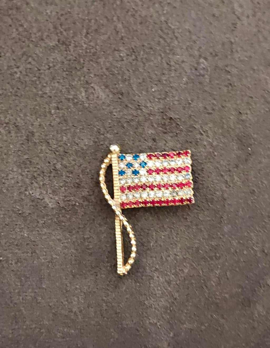Gold-tone American flag rhinestone pin brooch, small side view