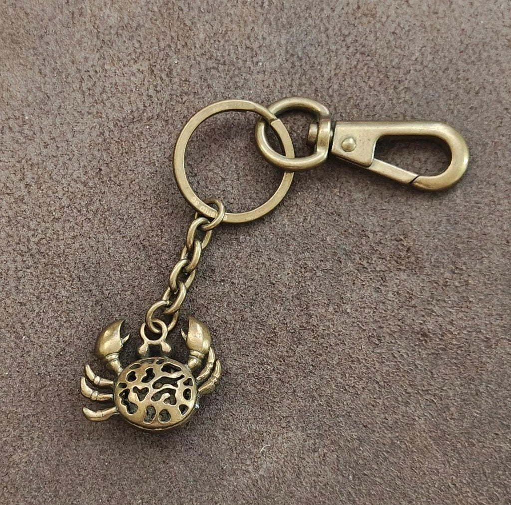 Bronze crab keychain charm on a chain with a double key ring and clasp.