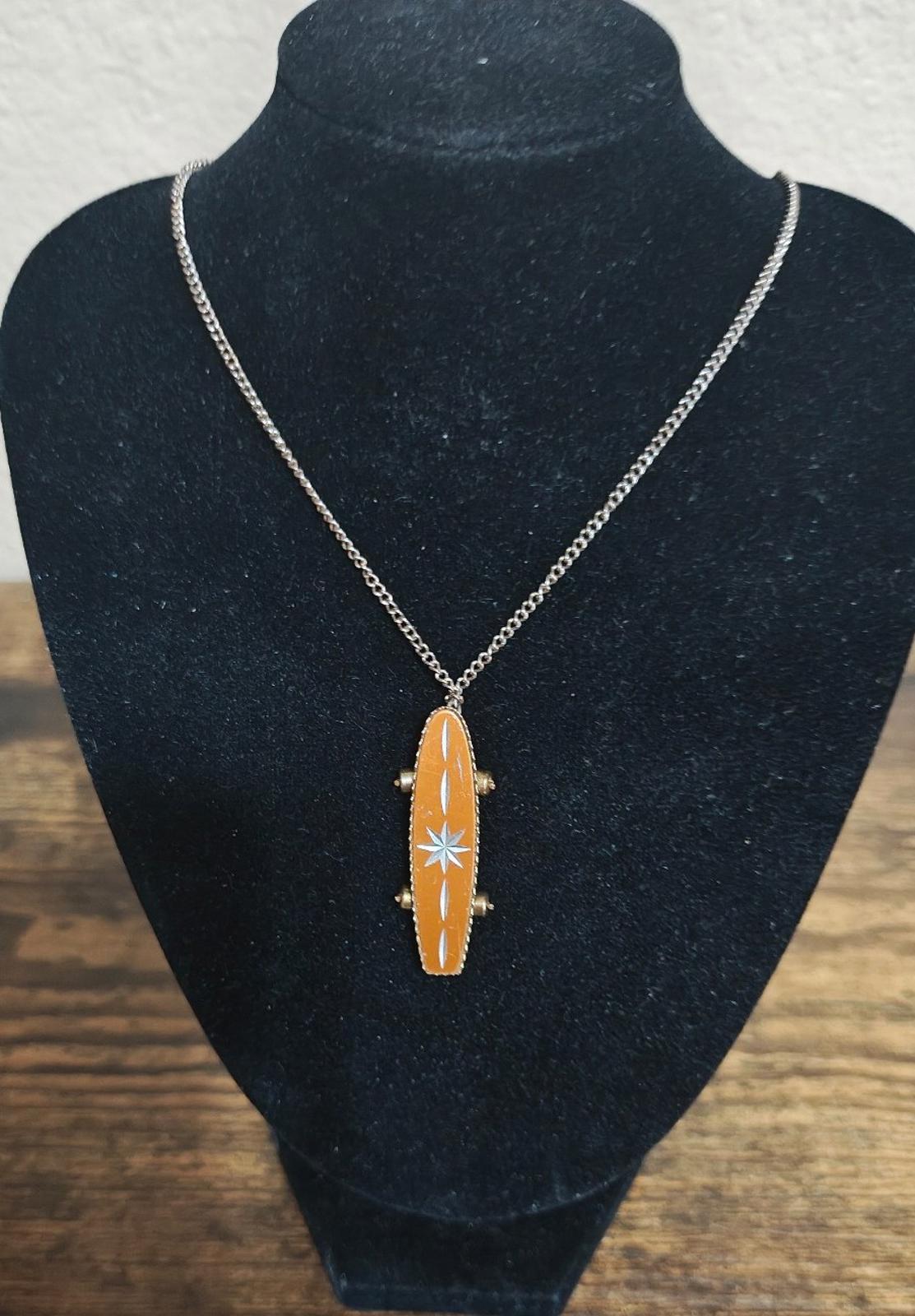 1980's MCM Starburst Skateboard Pendant Necklace with moveable wheels