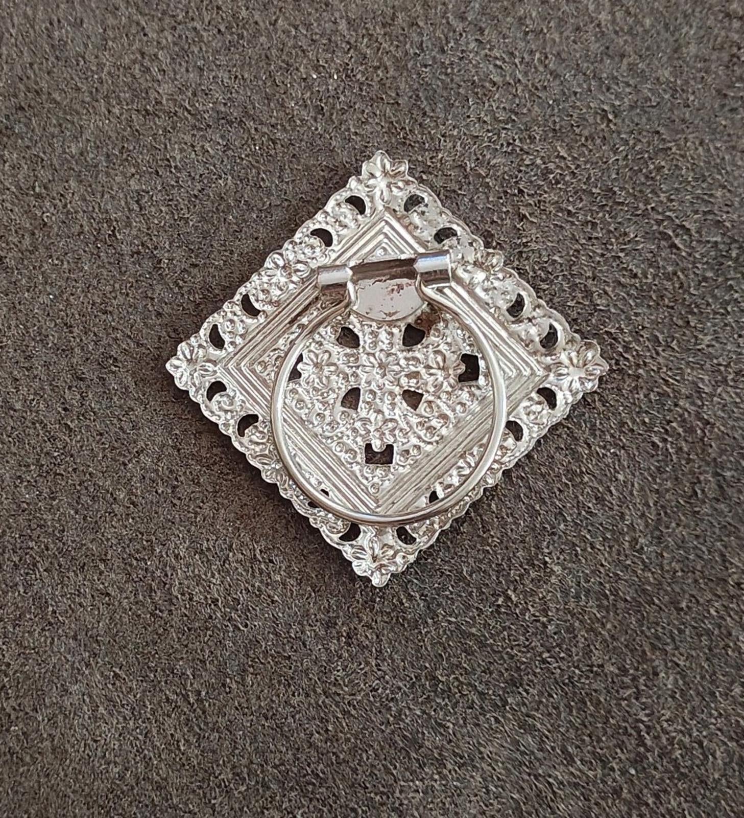 Silver-tone square open filigree scarf clip with cross-like openwork center panel