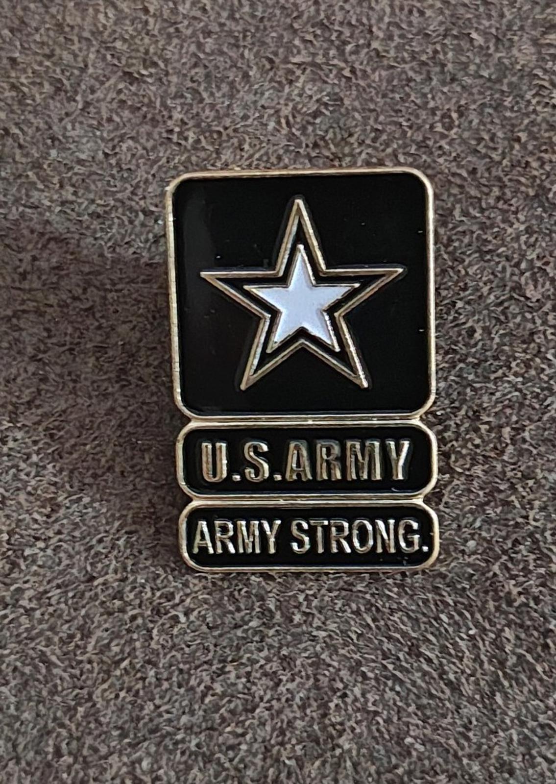 Black U.S. Army star lapel pin with U.S. ARMY and ARMY STRONG sayings