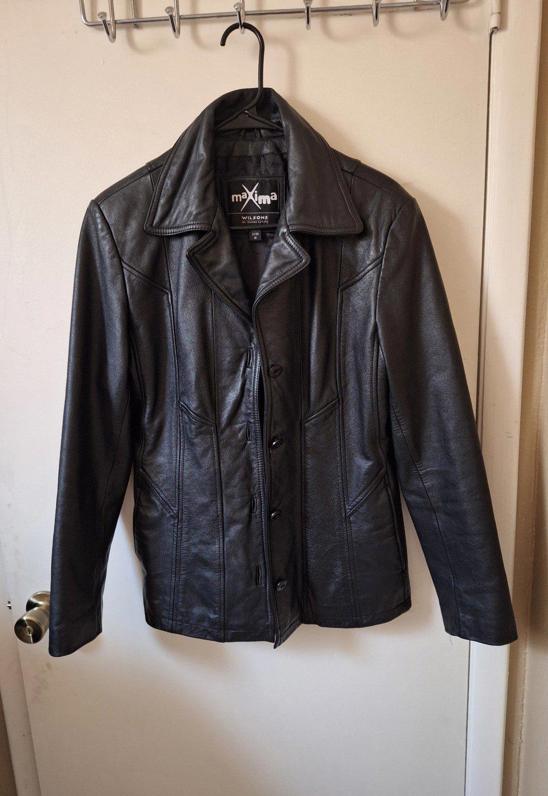 Women's Wilson's Maxima black leather jacket on hanger, button front and lapel detail