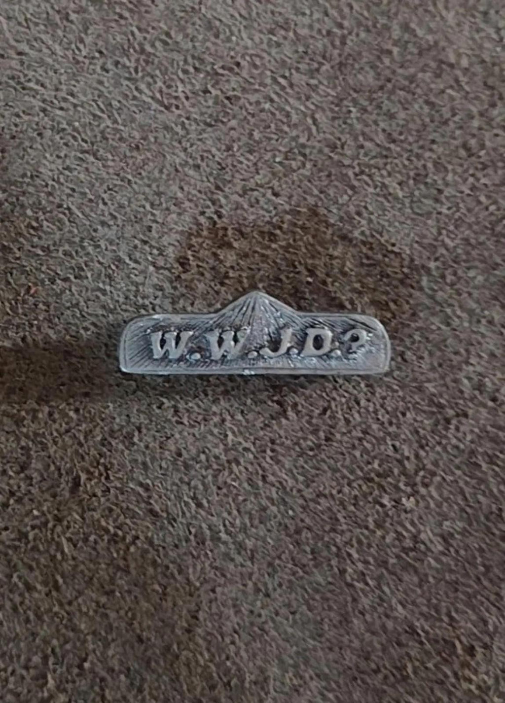 Pewter WWJD bar religious pin with raised WWJD text across the bar