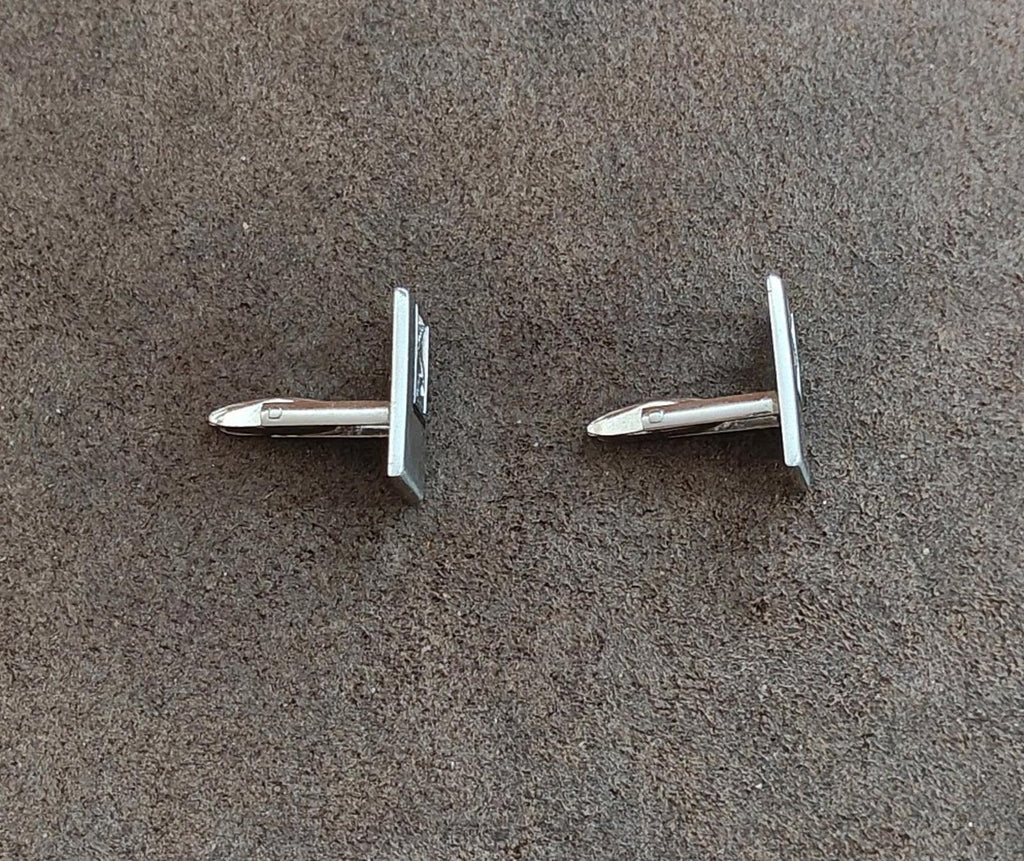 Silver-tone cufflinks back view with straight posts and hinged clasp area