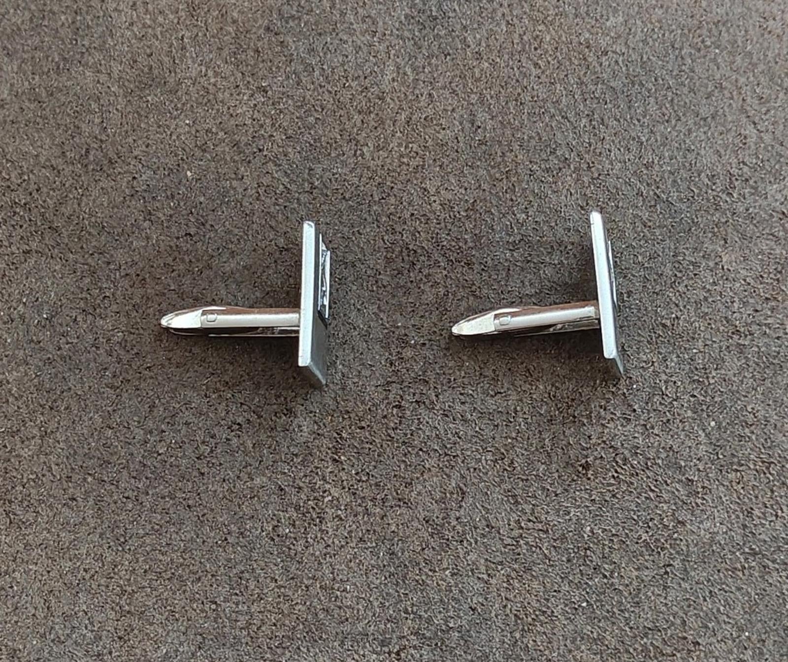Silver-tone cufflinks back view with straight posts and hinged clasp area