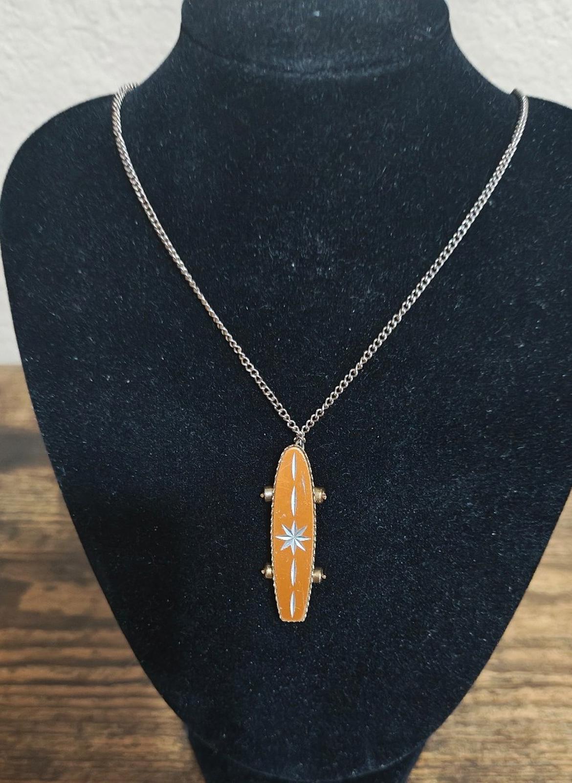 1980's MCM Starburst Skateboard Pendant Necklace with moveable wheels