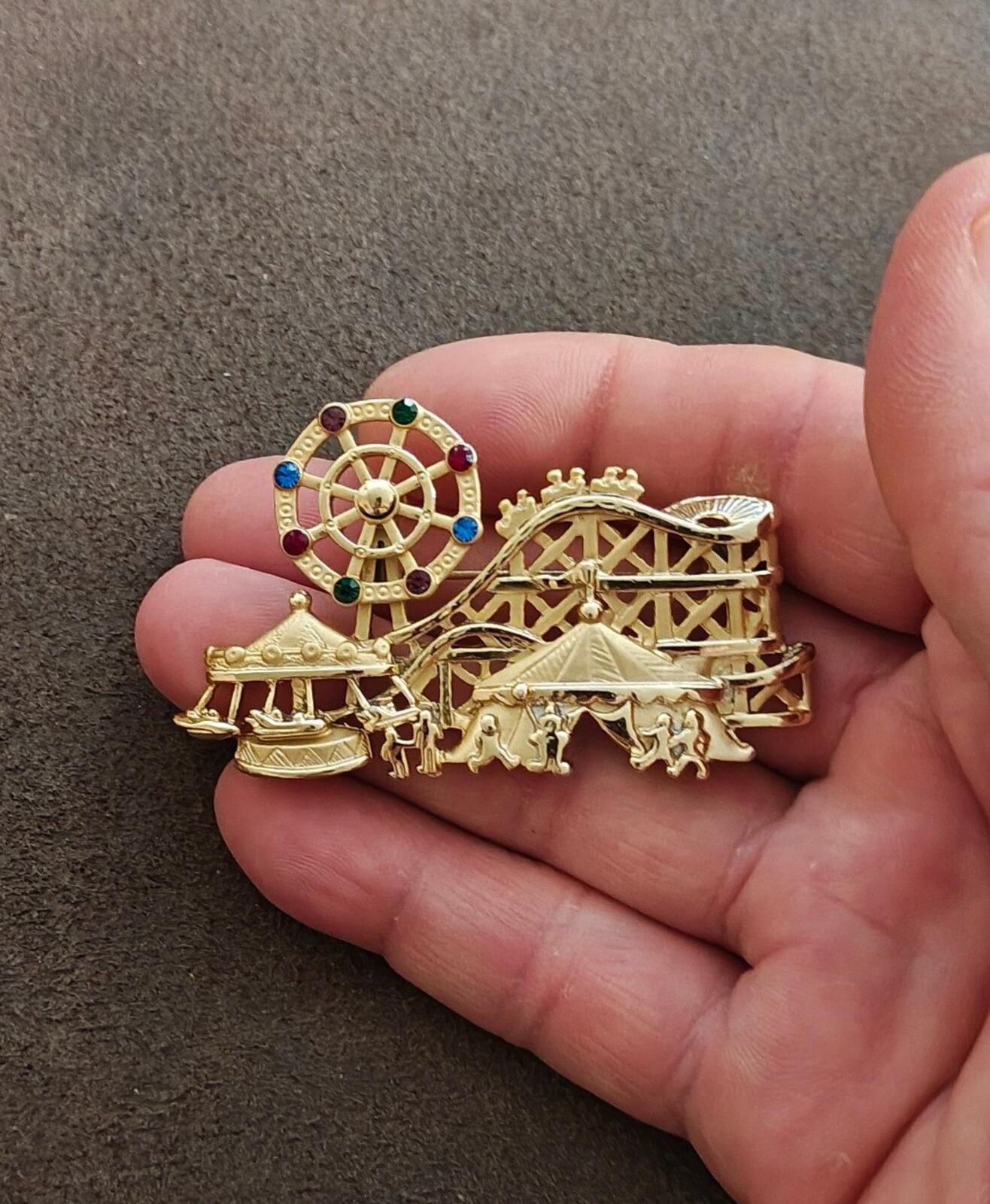 1980s Signed AJC Carnival Themed Gold Tone Brooch.