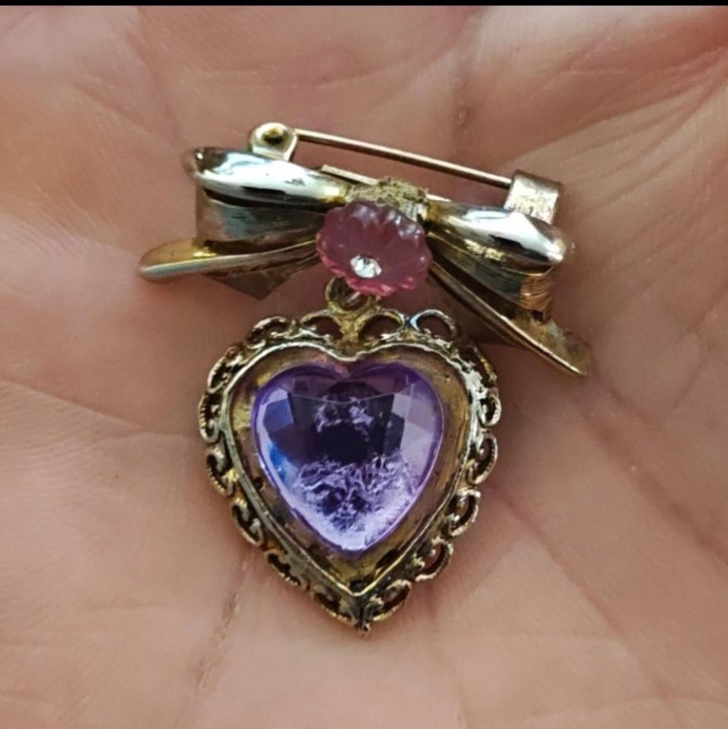 1980s Gold Tone Bow With Pink Flower & Filigree Edged Purple Stone Heart Brooch