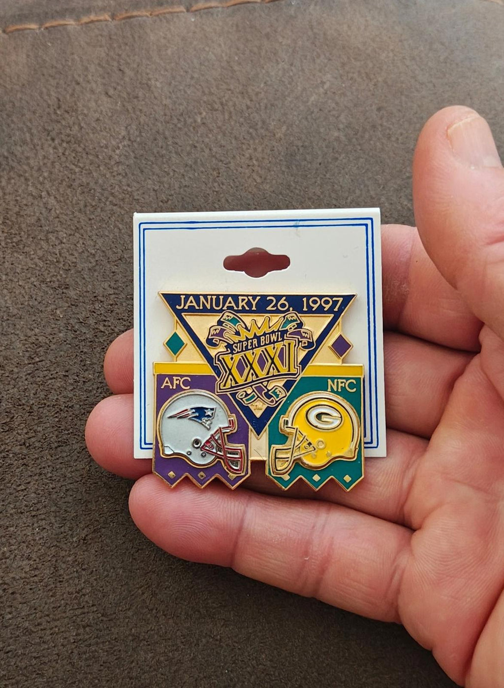 Super Bowl XXXI commemorative pin on card with January 26, 1997 and AFC/NFC logos