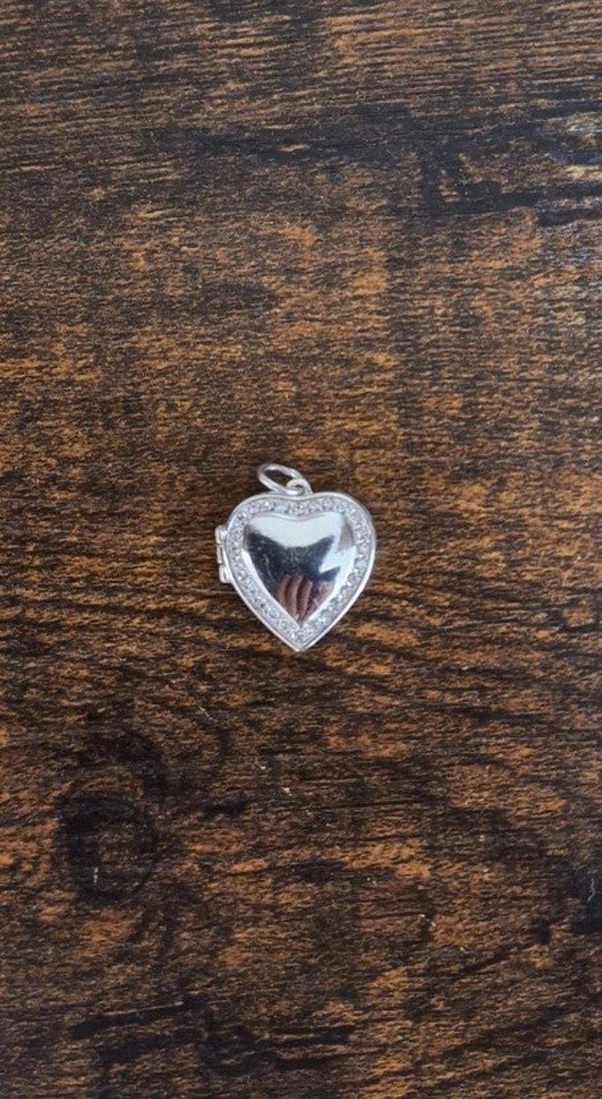 2004 Avon Silver and Clear Rhinestones Heart Locket Pendant