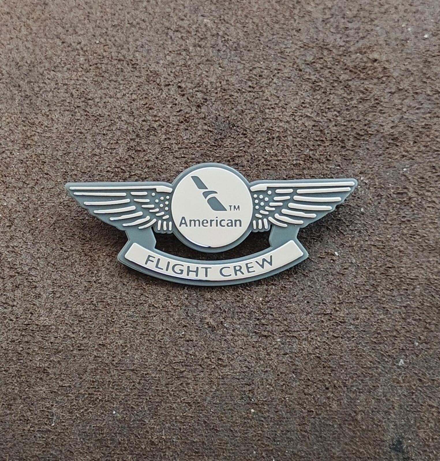 American Flight Crew badge pin, front view with winged emblem and 'FLIGHT CREW' bar