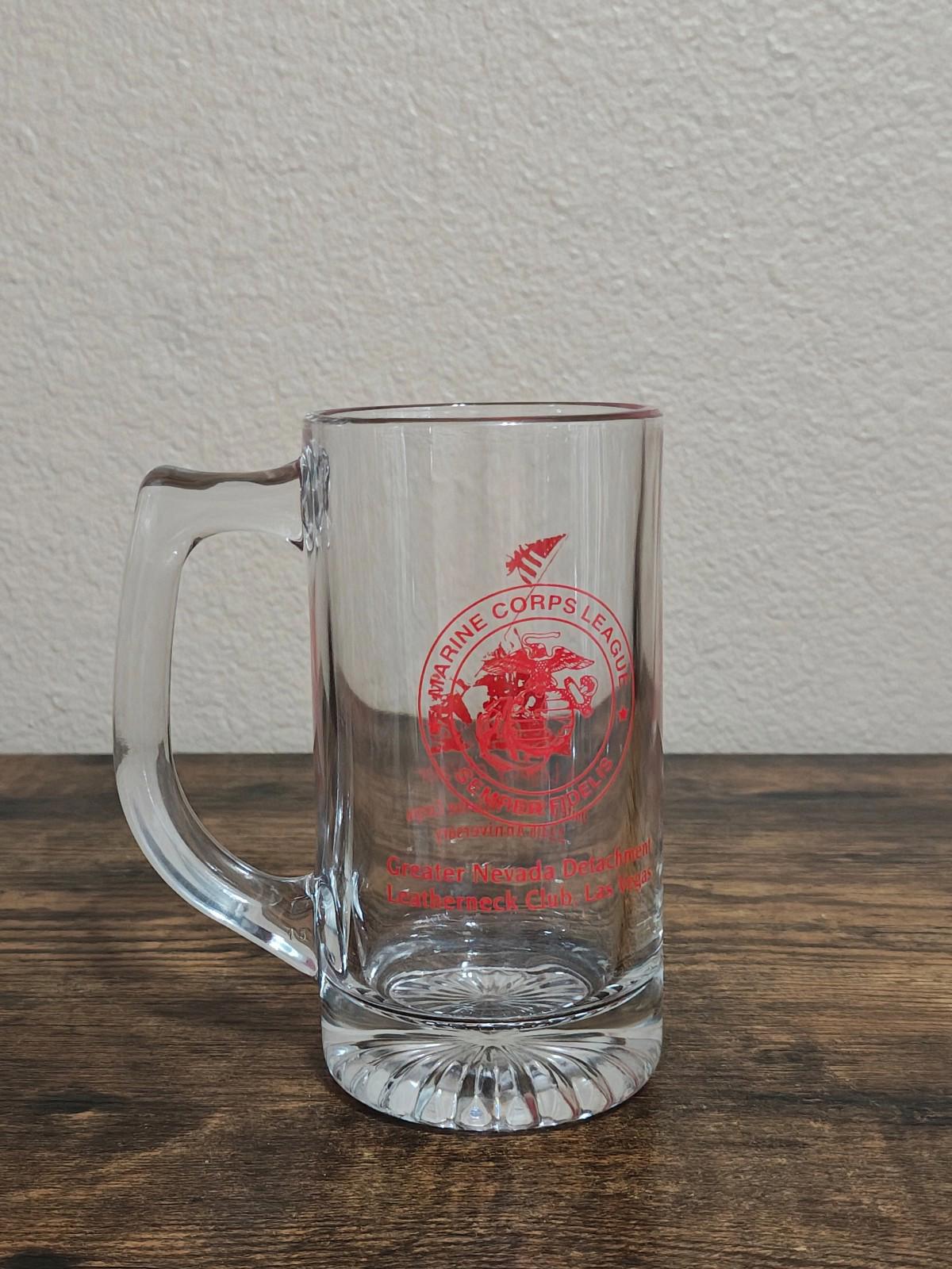 Clear beer mug with handle, red Marine Corps seal logo printed on the glass