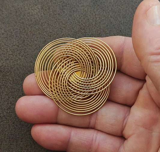 1970s Abstract Modernist Gold Tone Triple Ring Wire Spiral Brooch.