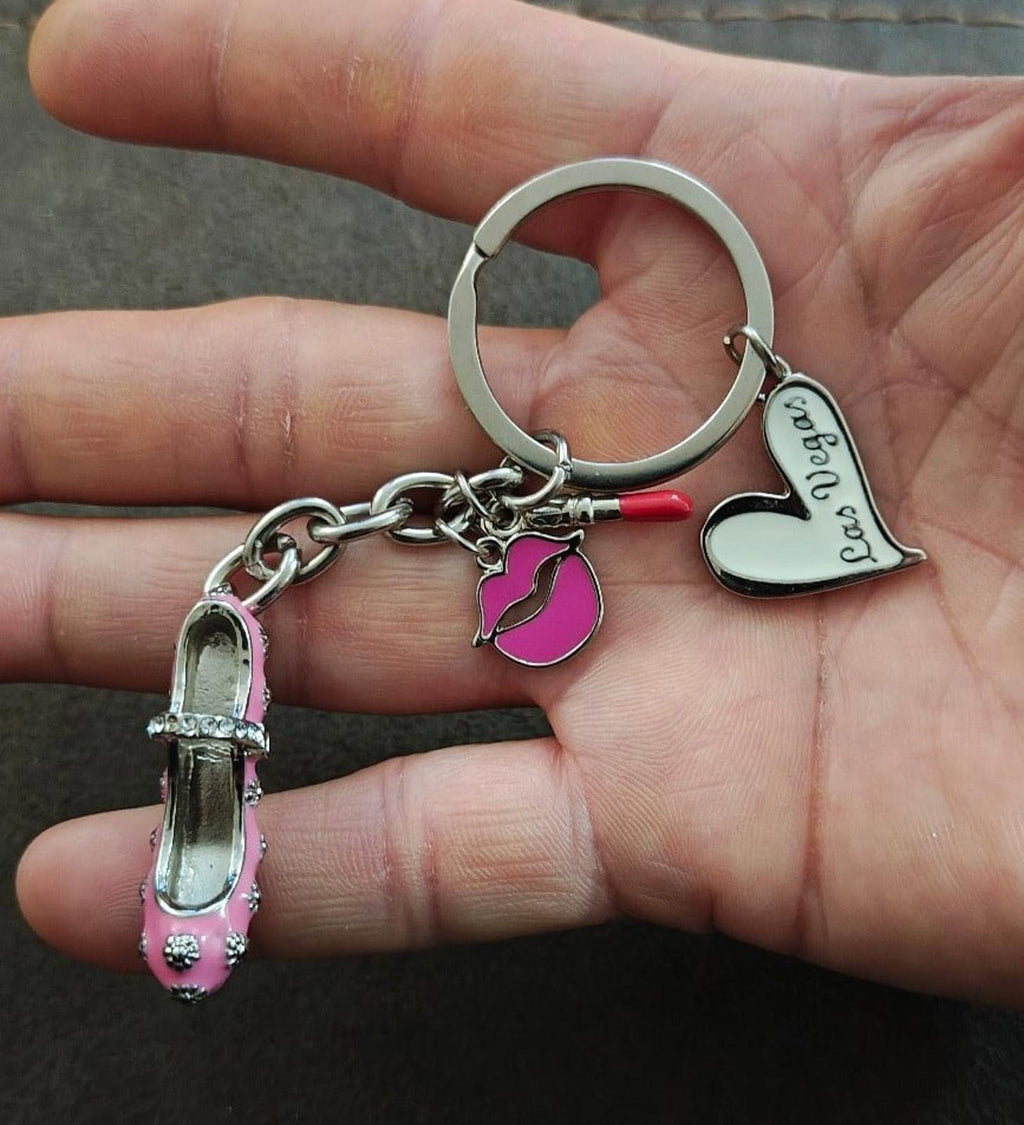 Pink high heel keychain charm with lipstick, heart, lips, and Las Vegas slogan dangles
