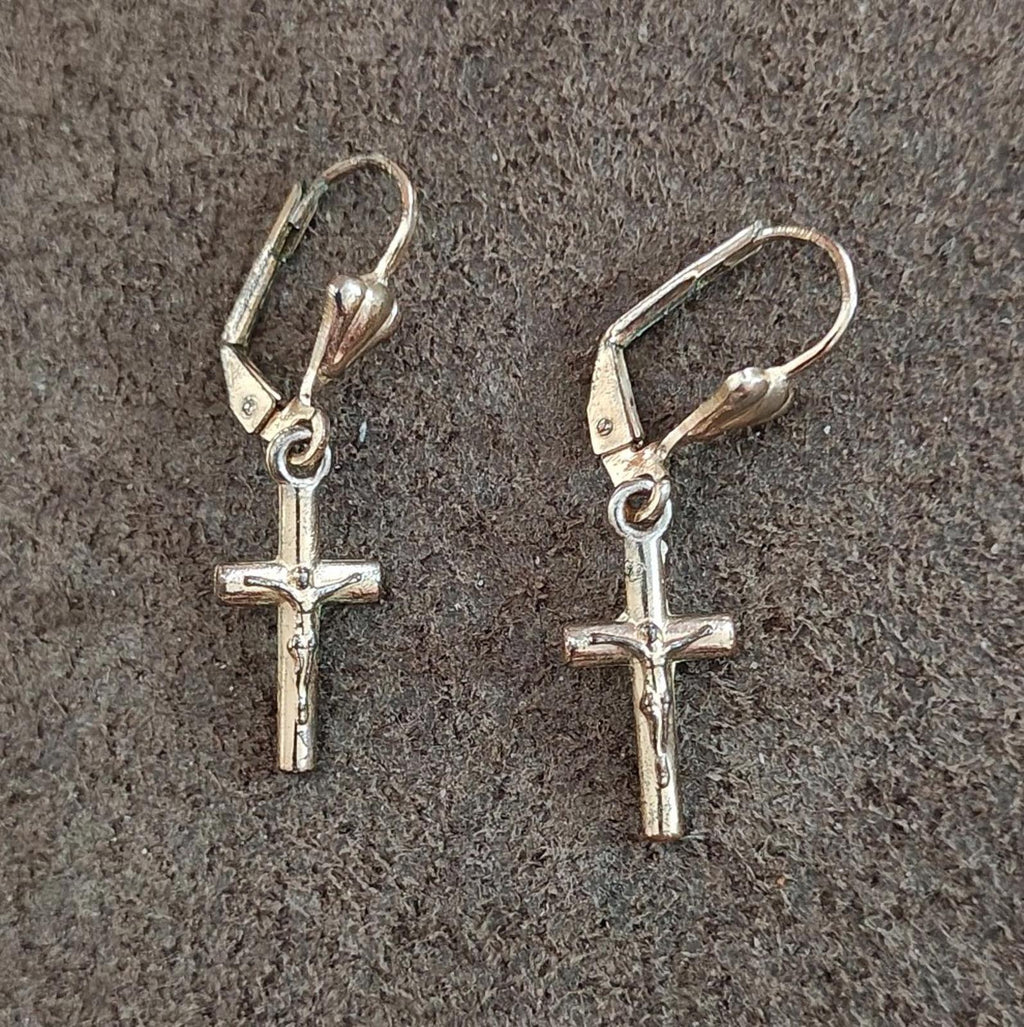 Silver-tone cross drop earrings with heart top charms and lever hook backs.