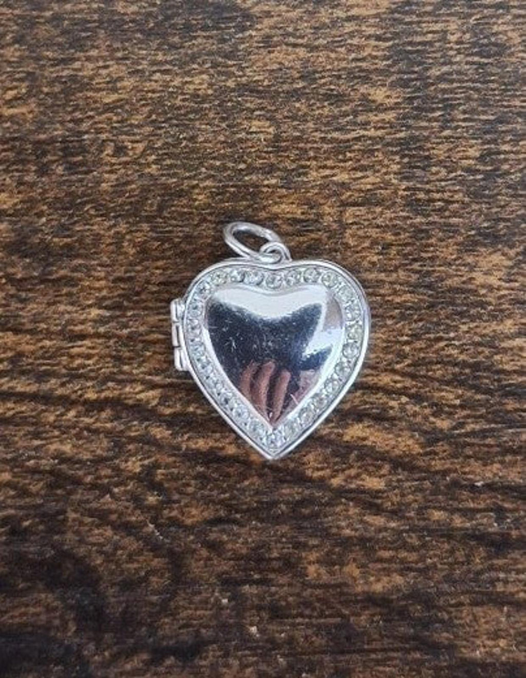 Silver heart locket pendant with clear rhinestones and small top loop