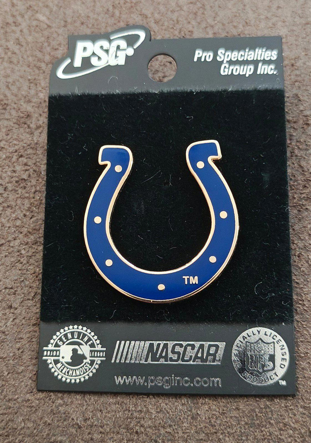 Blue horseshoe enamel pin on PSG card backing with mounting hole at top