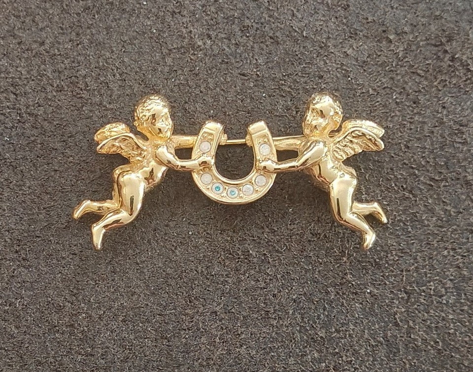 1980s Unsigned Kirks Folly Gold Tone Cherub & Lucky Horseshoe Brooch Pin