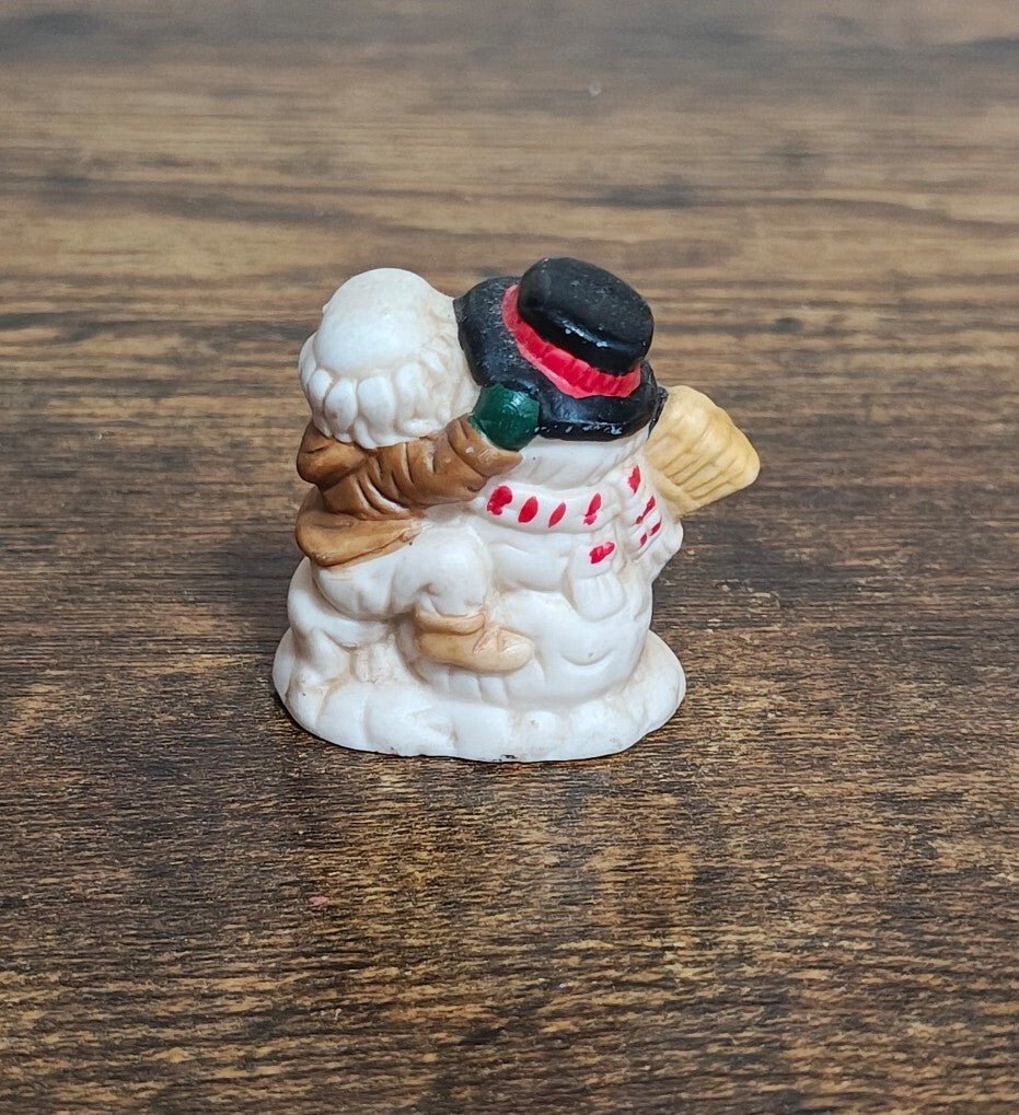 1993 Mercuries Miniature Snowman Hugging a Christmas Elf Or Gnome Ceramic Figure - Trinketmania-LV