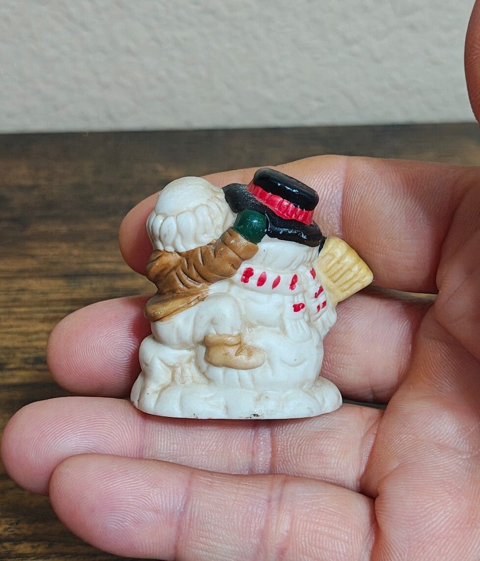 1993 Mercuries Miniature Snowman Hugging a Christmas Elf Or Gnome Ceramic Figure - Trinketmania-LV