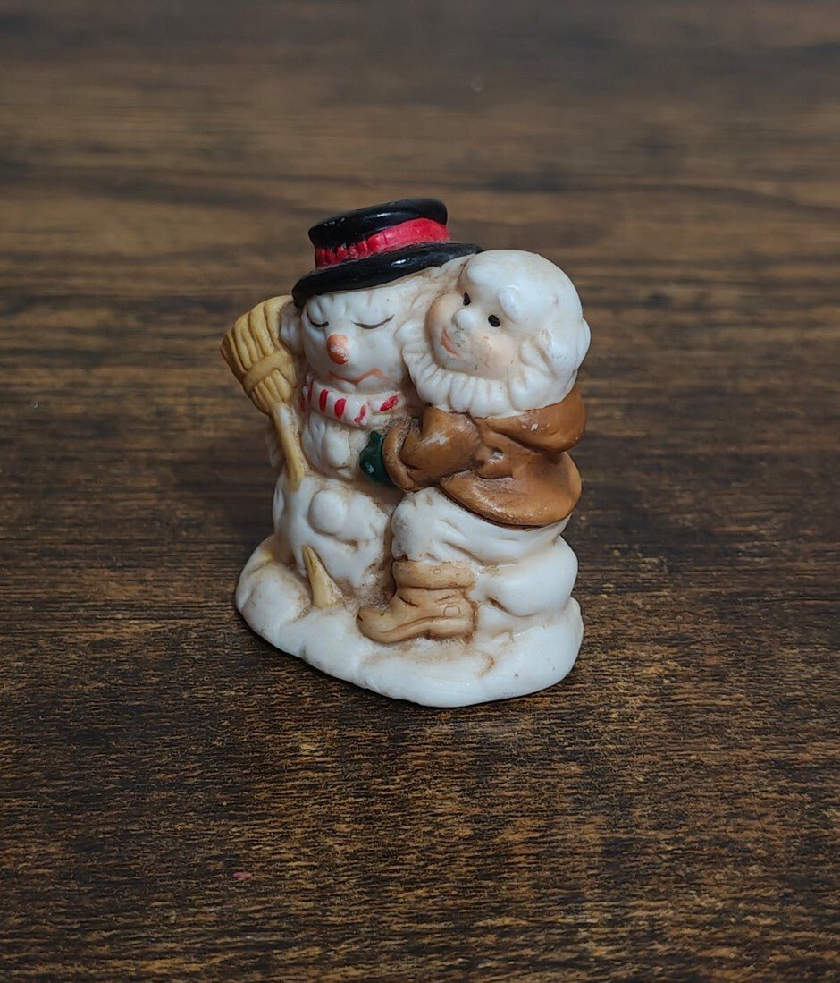 1993 Mercuries Miniature Snowman Hugging a Christmas Elf Or Gnome Ceramic Figure - Trinketmania-LV