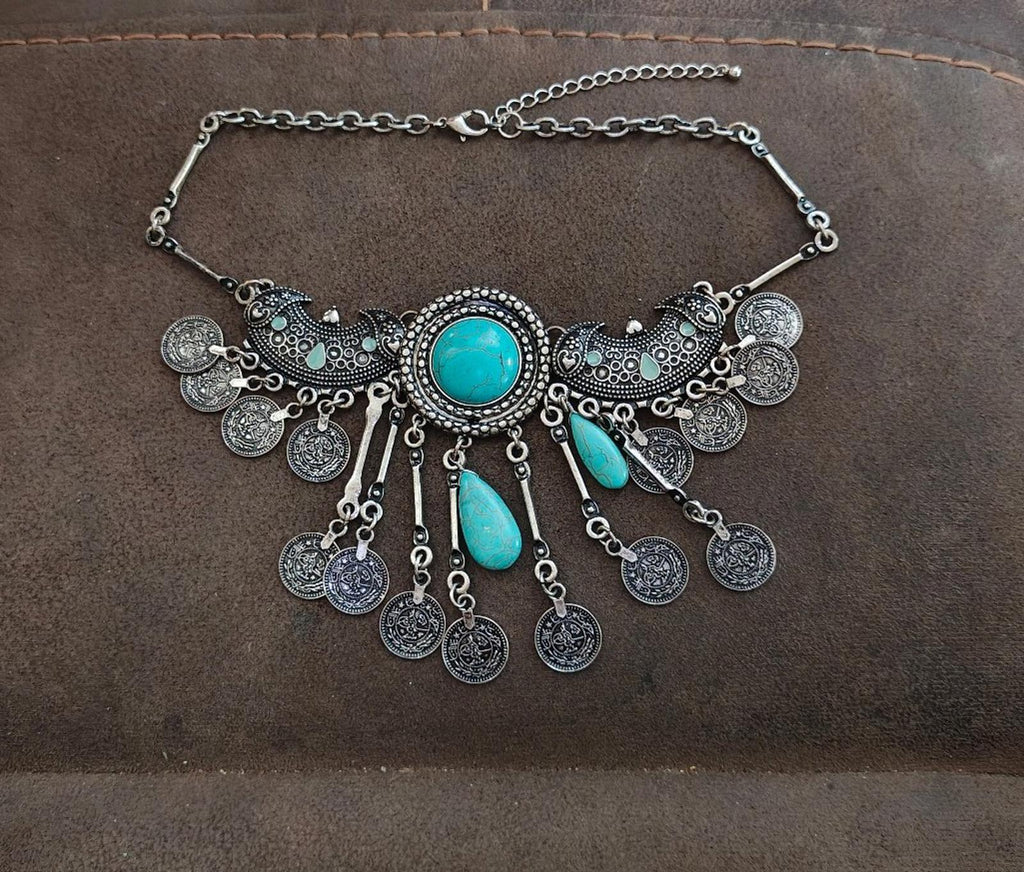 Silver tone boho bib statement necklace with turquoise blue cabochon and dangling coins