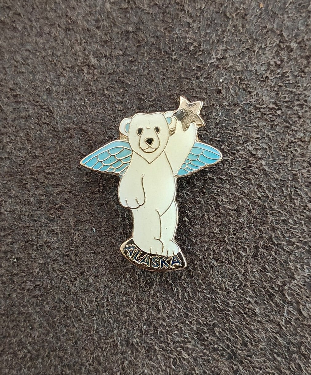1980s Alaskan Polar Bear Guardian Angel Gold Tone Enamel Pin.
