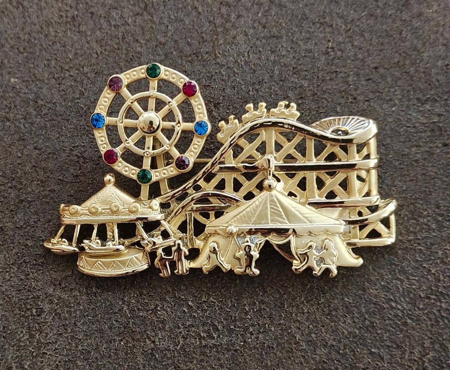 1980s Signed AJC Carnival Themed Gold Tone Brooch.