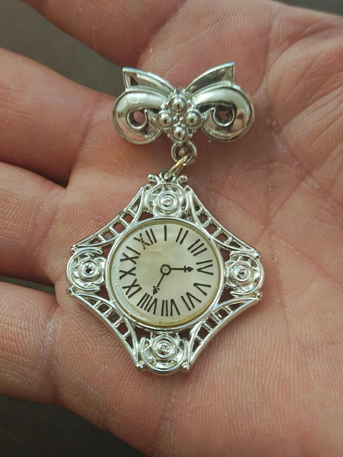 1980s Silver Tone Art Deco Style Bow Clock Motif Dangle Brooch
