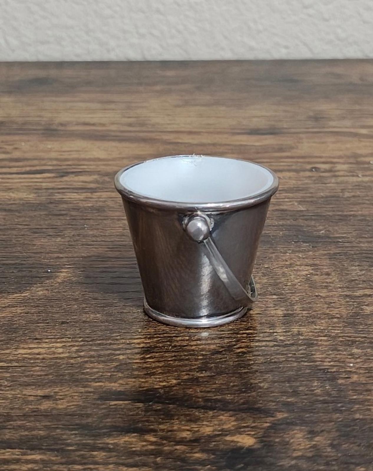 Mini silverplated bucket pail with side handle and white interior