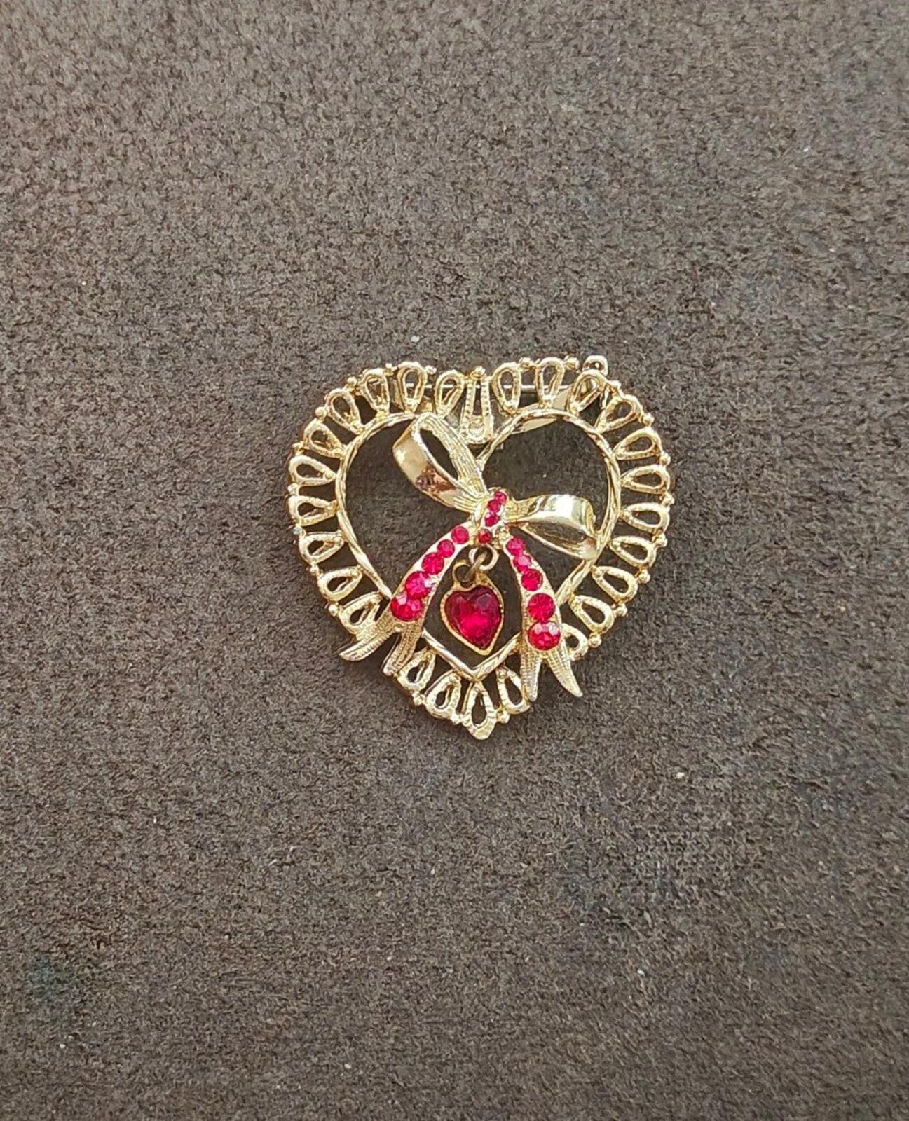1980s  Gold Tone With Red Rhinestone Accents & a Dangling Center Heart Brooch
