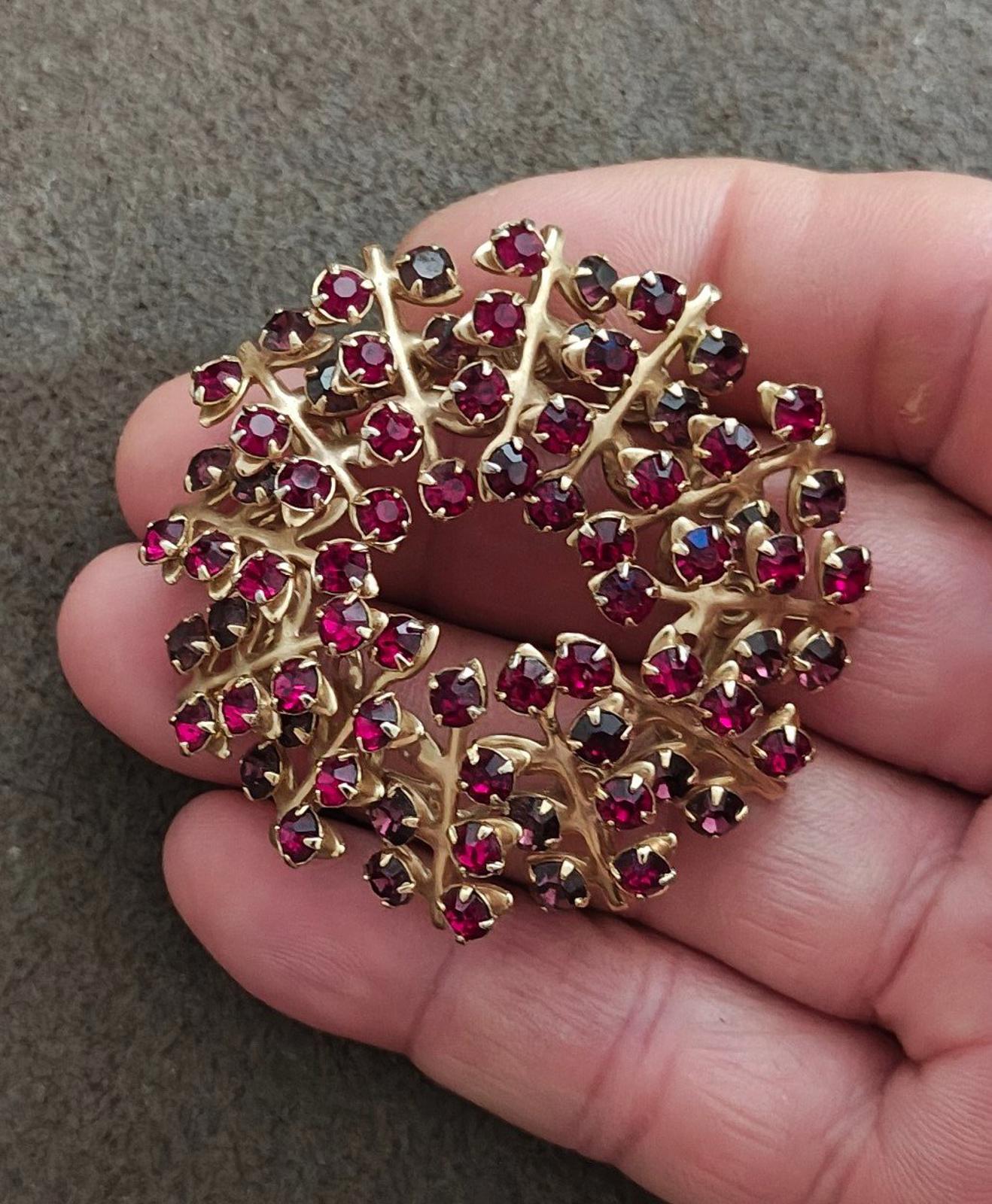 Gold-tone rhinestone brooch pin with maroon and dark red oval stones