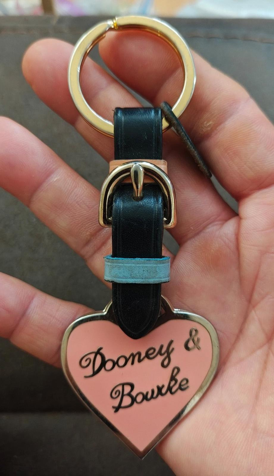 Dooney & Bourke heart keychain with black leather strap, light blue accent, gold ring