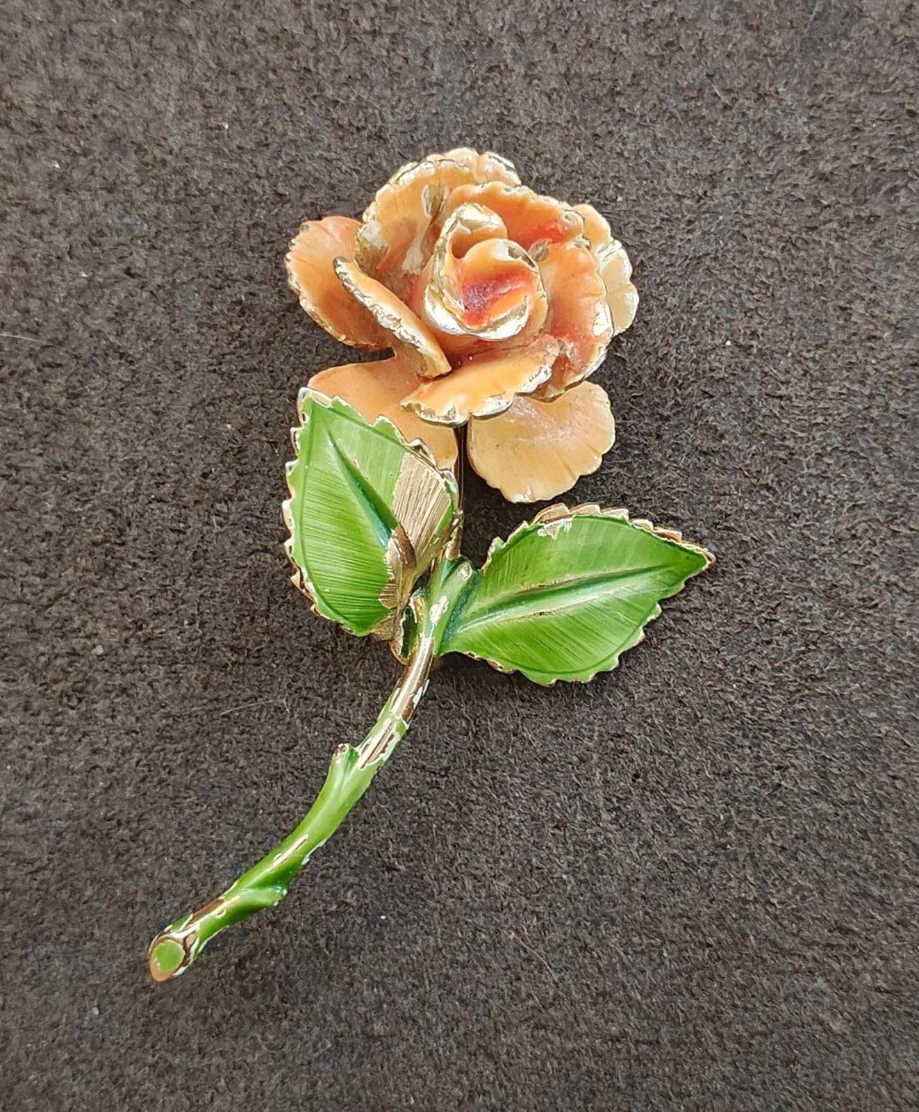 Gold-tone enamel rose and leaf pin, orange flower face with green leaves and stem