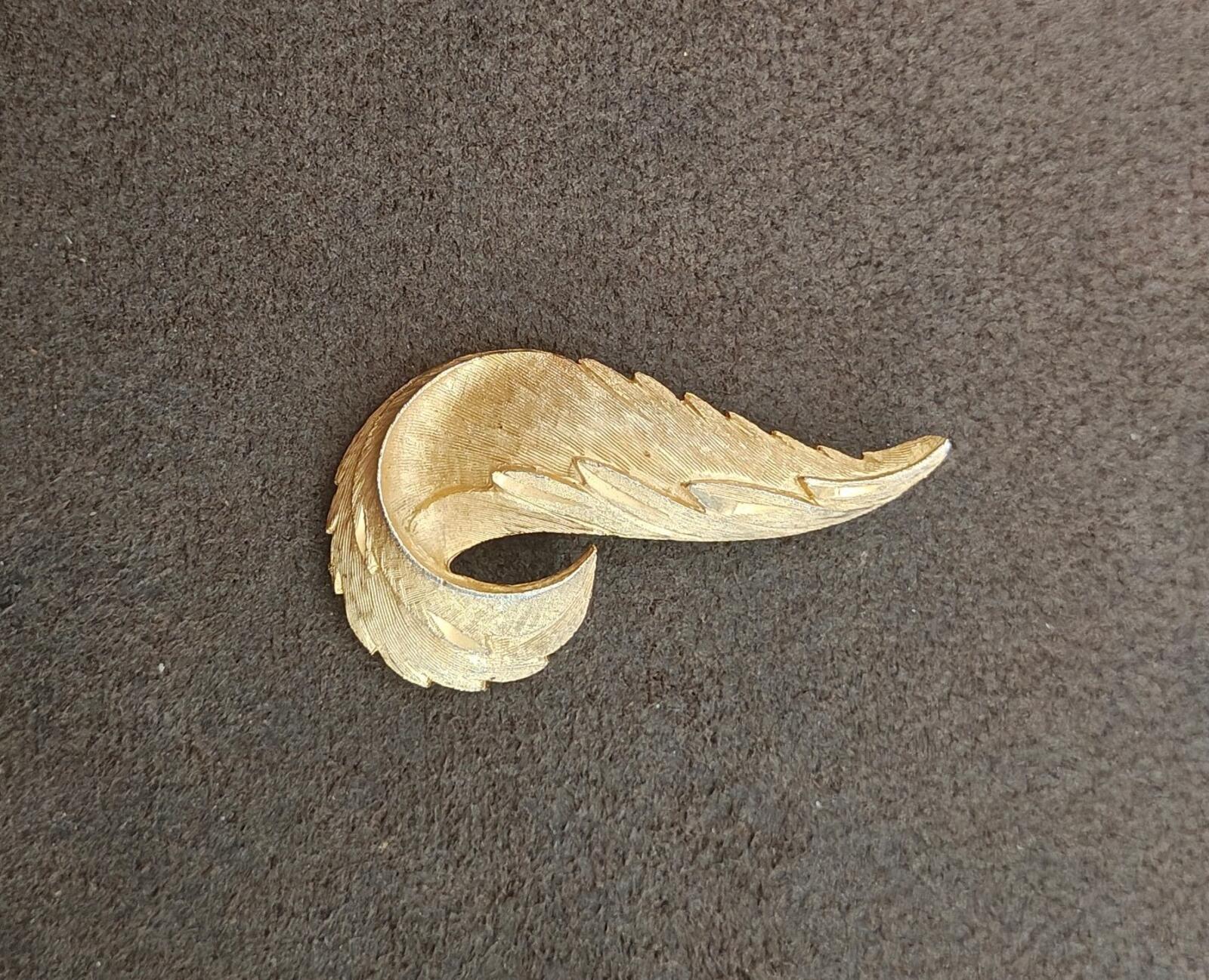 1960s Gold Tone Textured Feather Swirl Brooch